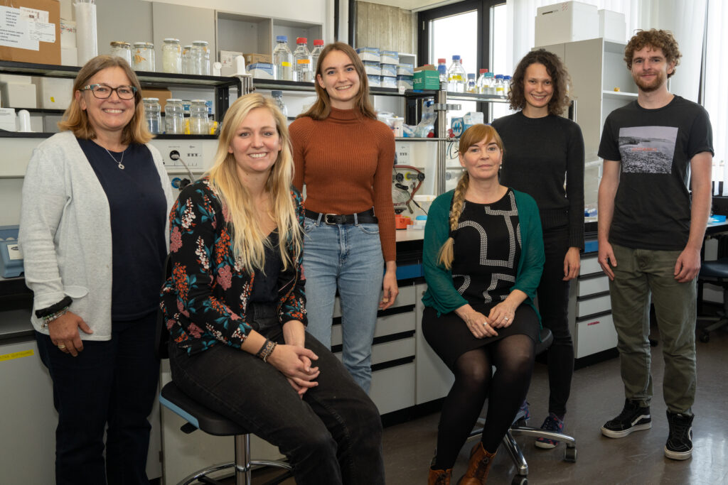 The Perica Lab team standing together outside the Institute of Biochemistry